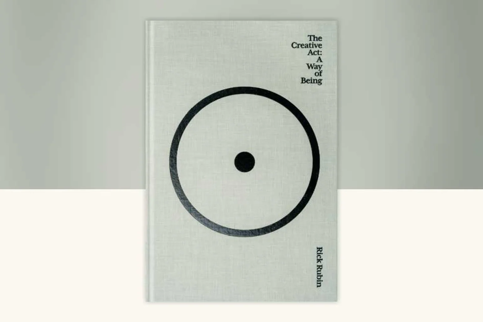 The white cover of Rick Rubin’s The Creative Act against a warm neutral field.